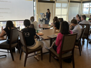 Sandra González-Bailón speaking to a group of students and faculty at Wesleyan University.